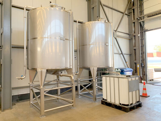 2 x New Stainless Steel AISI 304L Vertical Storage Tanks of 5,400L on a stainless steel construction.