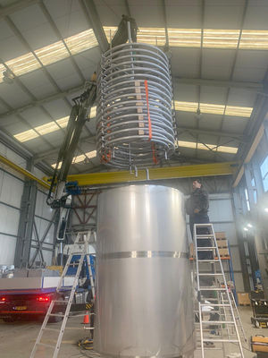 Stainless Steel AISI316 mixing tank 8100L with a double heating coil inside the tank. The tank is insulated with rockwool and cladded with aluminium.