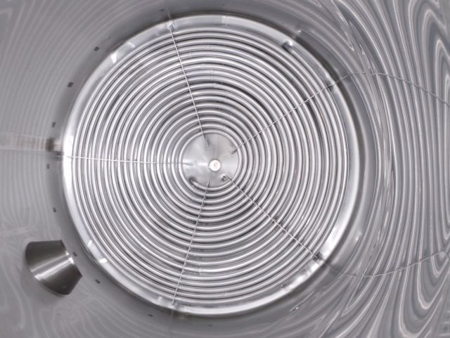 1 x 14.4m³ AISI304; warmtewisselaar; geisoleerd; roerwerk; vertikaal; conisch