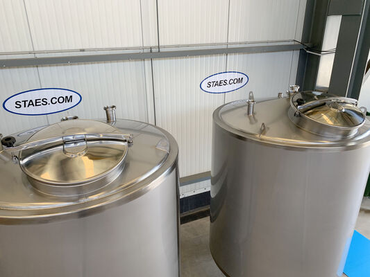 2 x 2,000L stainless steel AISI 304L vertical tanks with insulation and a welded decorative jacket