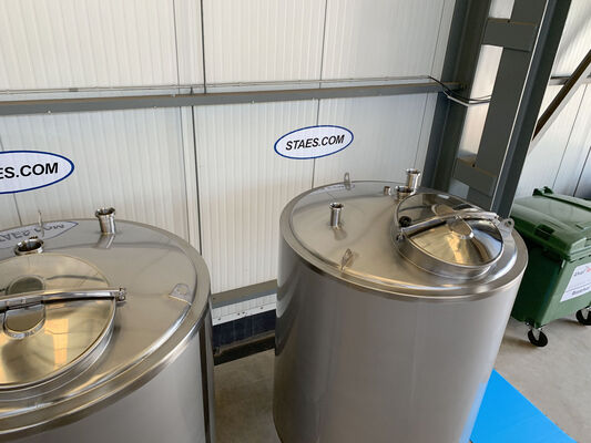 2 x 2,000L stainless steel AISI 304L vertical tanks with insulation and a welded decorative jacket