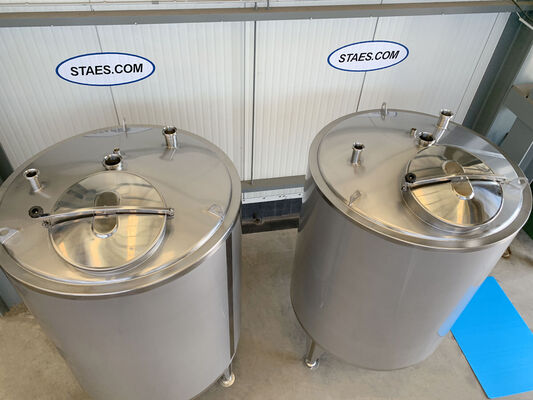 2 x 2,000L stainless steel AISI 304L vertical tanks with insulation and a welded decorative jacket